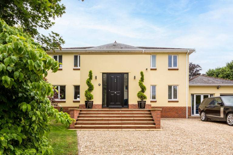 New Build House With Paved Stairs To Entrance